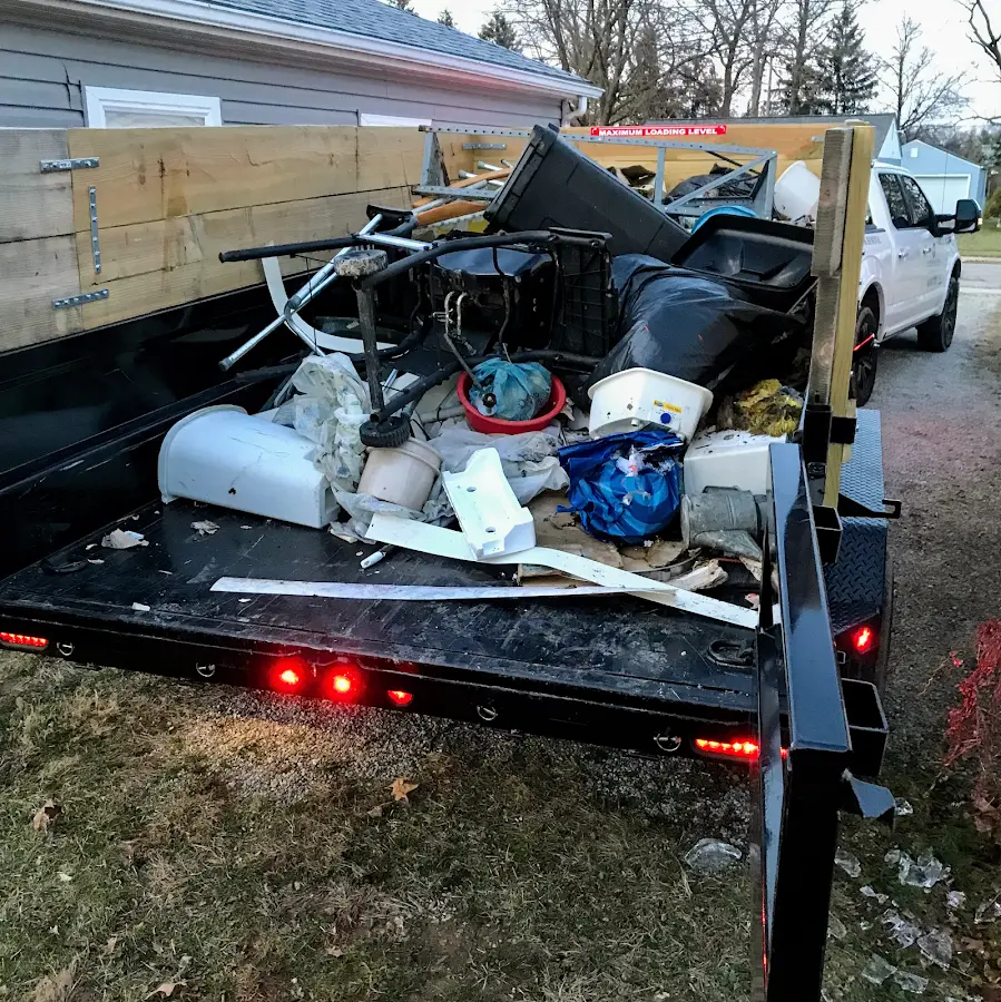 Roll-off dumpster delivered to a residential driveway in Unity