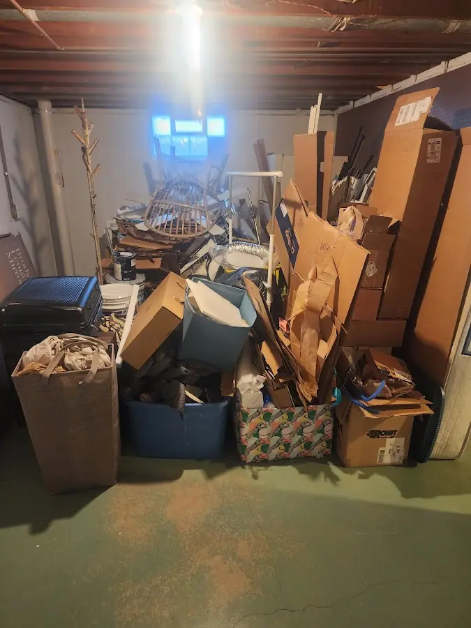 Roll-off dumpster container at job site for Yard Waste Dumpster Rental in Unity